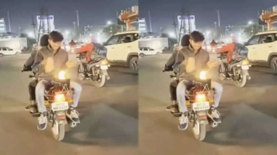 इंदौर में बीच सड़क पर बाइक के पीछे जलती सिकड़ी से हाथ सेकते हुए स्टैंड करने का वीडियो वायरल